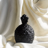 A MATTE BLACK PINECANDLE