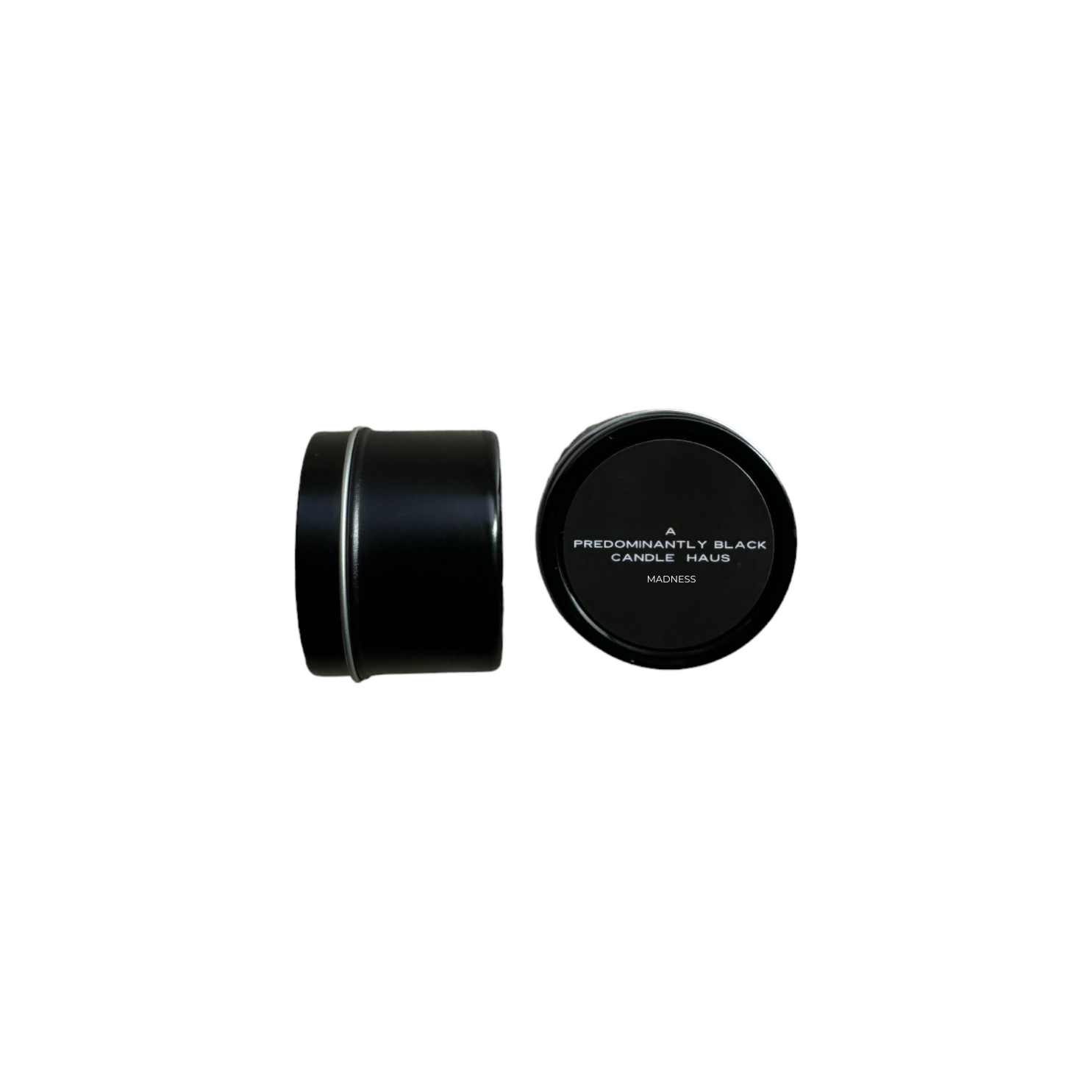 Predominantly Black 2 ounce MADNESS candle container with lid, featuring minimalist label design.