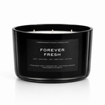 FOREVER FRESH soy-coconut scented candle in a wide black vessel; lemon and clean linen fragrance — Predominantly Black