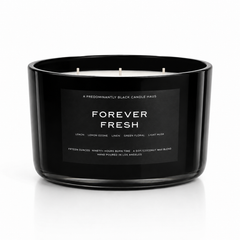 FOREVER FRESH soy-coconut scented candle in a wide black vessel; lemon and clean linen fragrance — Predominantly Black