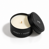 HONEY & HERBS 2 oz Tiny Tin mini scented candle with lid removed; honey and lavender fragrance — Predominantly Black