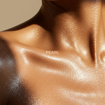 Sun Glaze Shimmer Body Oil: light-catching shimmer oil finish on shoulders and chest — Predominantly Black