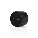 OPULENCE wax melt in a closed black tin; rose and black oud fragrance — Predominantly Black