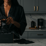 HAUS DISCOVERY soy-coconut scented candle Subscription: person holding a candle in a dark interior — Predominantly Black