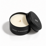 SWEET SURRENDER 2 oz Tiny Tin mini scented candle with lid removed; tobacco and vanilla fragrance — Predominantly Black
