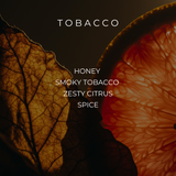 TOBACCO fragrance-note graphic over tobacco leaf and orange — Predominantly Black