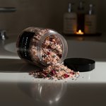 WILD ROSE bath salts spilling from a jar; rose and jasmine fragrance — Predominantly Black